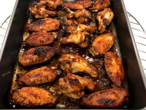 A tray of roasted chicken wings